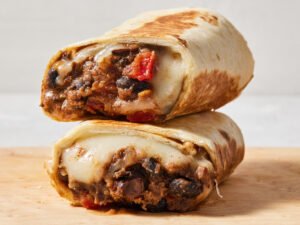 Stack of two bean burritos.